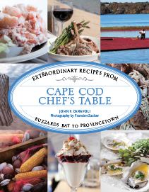 The cover of the cookbook "Extraordinary Recipes from Cape Cod Chef's Table" by John F. Carafoli, featuring a collage of food images including shellfish, a steak dish, a milkshake, raw oysters, and a cranberry bog.
